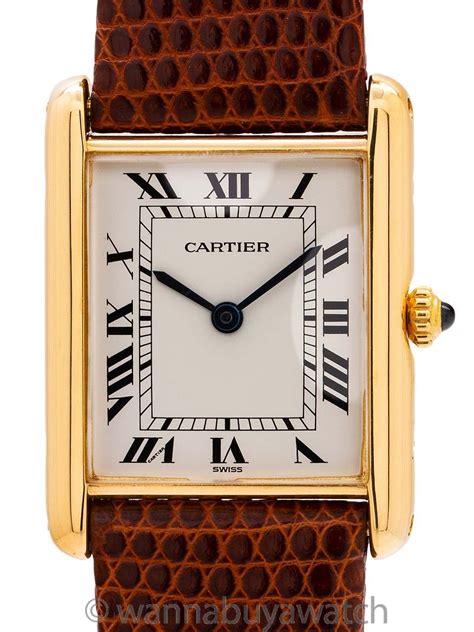 pre owned cartier tank watch.